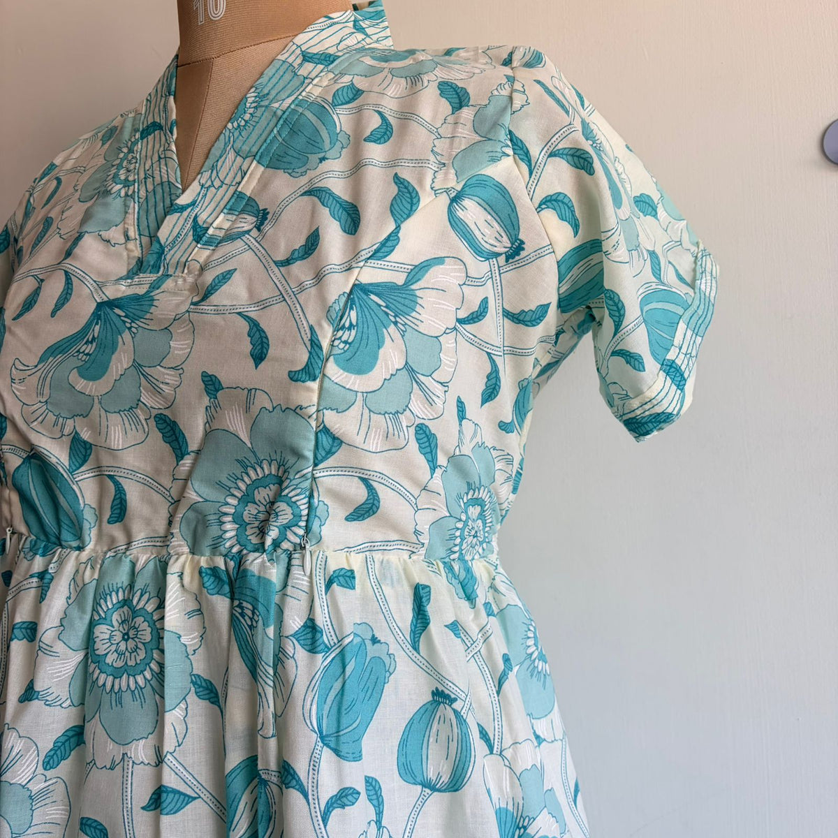 Aqua Blue Floral Printed Cambric Cotton With Cotton Lining V Collar Neck Short Maternity Gown | Free Size |