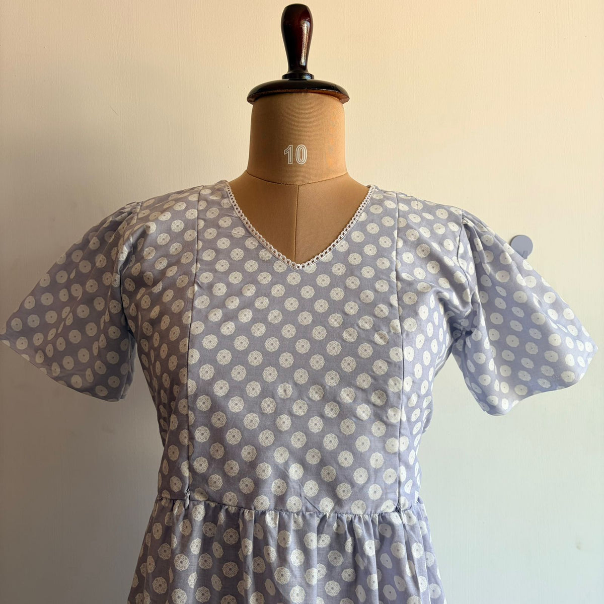 Lavender Floral Printed Cambric Cotton V Neck Puff Sleeve Feeding Gown With Two Side Invisible Zip And Back Tie | Free Size |