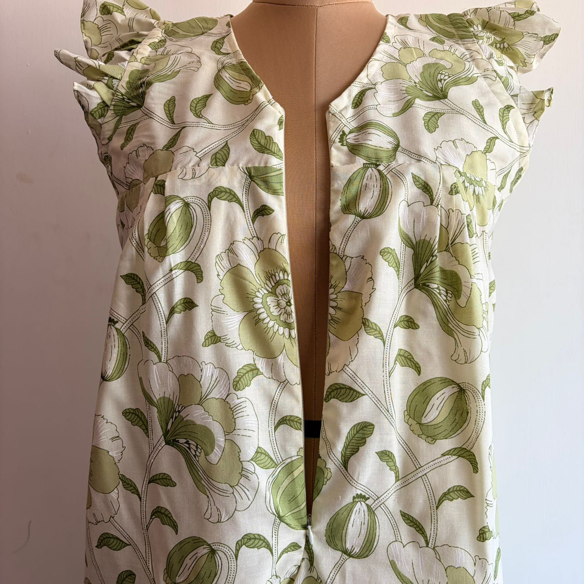 Green Floral Printed White Cambric Cotton V- Neck Ruffle Sleeve Long Zip Short Maternity Gown | Free Size | Chest Width 44″| Length 44″|