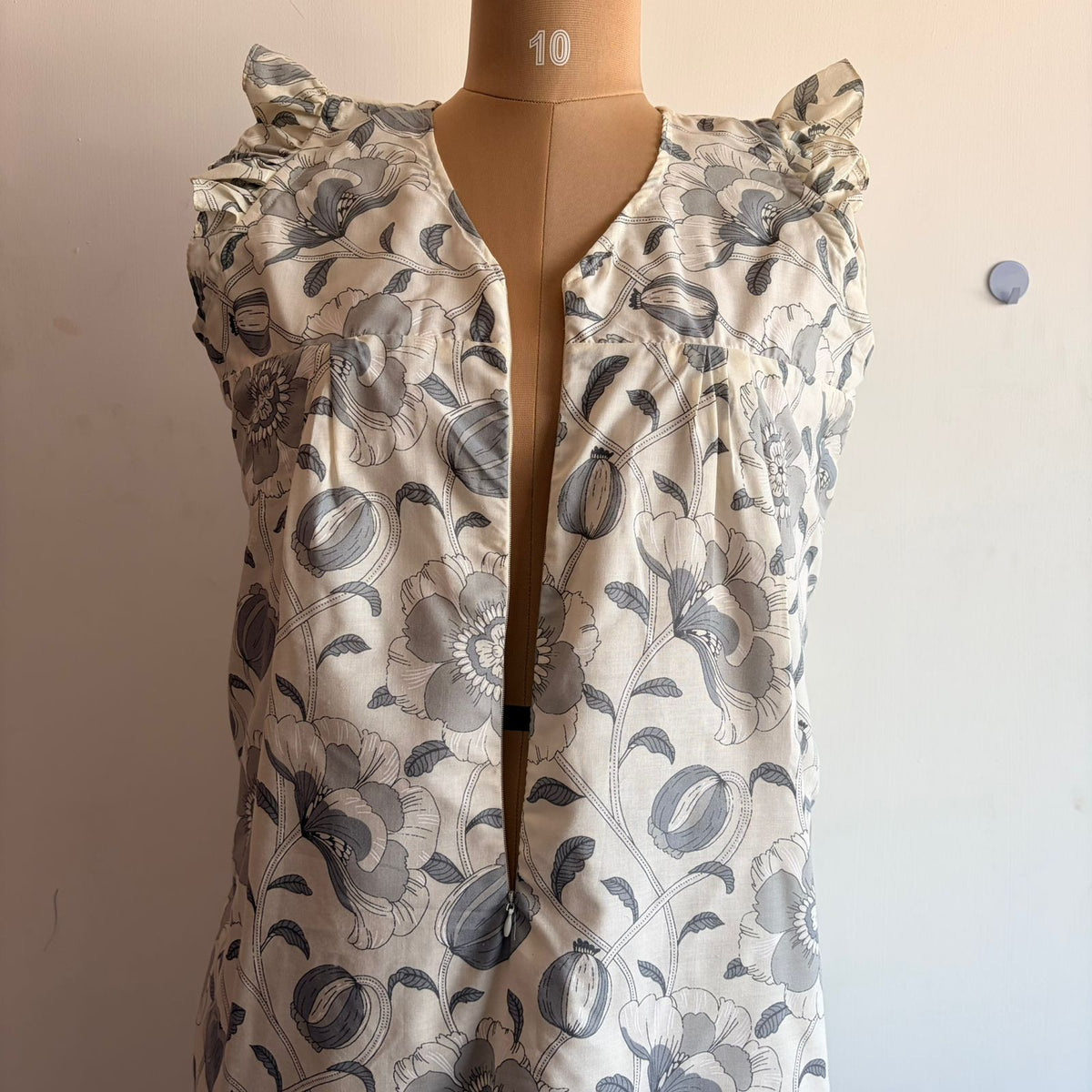 Grey Floral Printed White Cambric Cotton V- Neck Ruffle Sleeve Long Zip Short Maternity Gown | Free Size | Chest Width 44″| Length 44″|