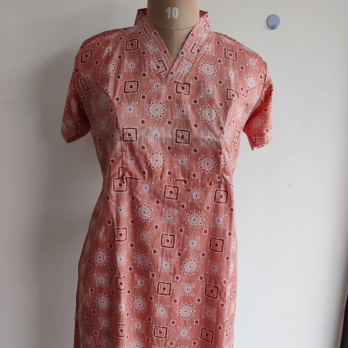 Garage Sale - Pastel Orange Printed Premium Cotton V Collar Neck Short Short Maternity Gown